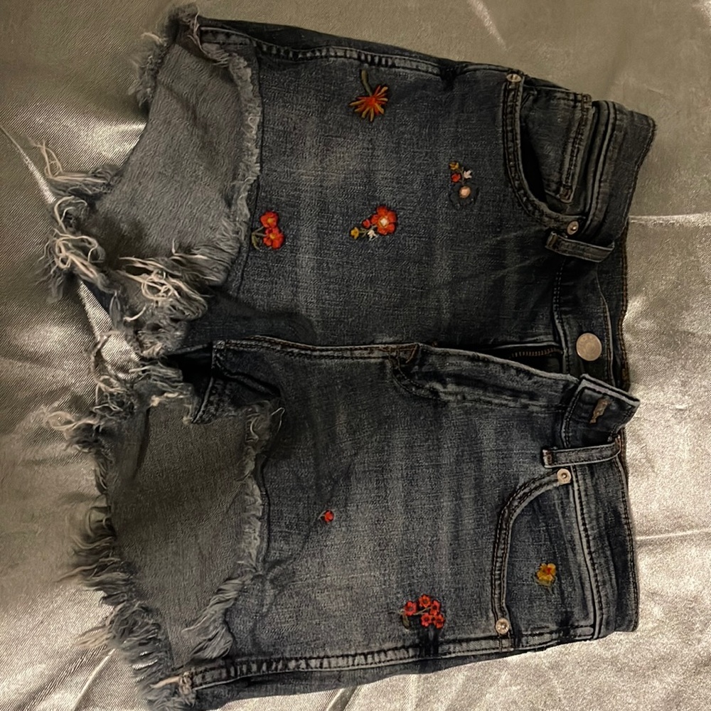 Denim shorts with embroidered flower designs